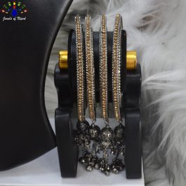 Jewels of Nepal Gunmetal Toned Stone Studded Pinjada Drop Metal Bangles / Bala For Women- Set of 4 pcs